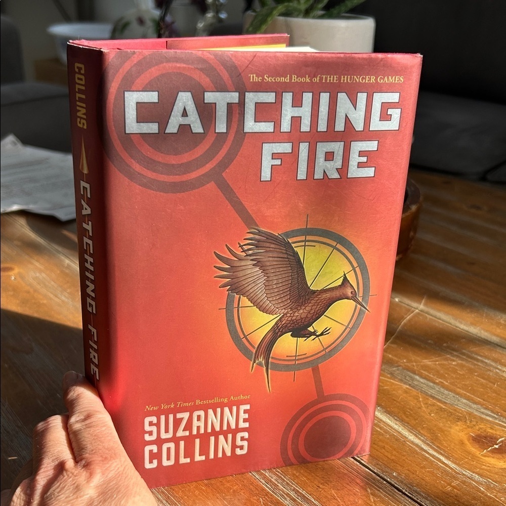 Catching Fire by Suzanne Collins - Red Hardcover Edition